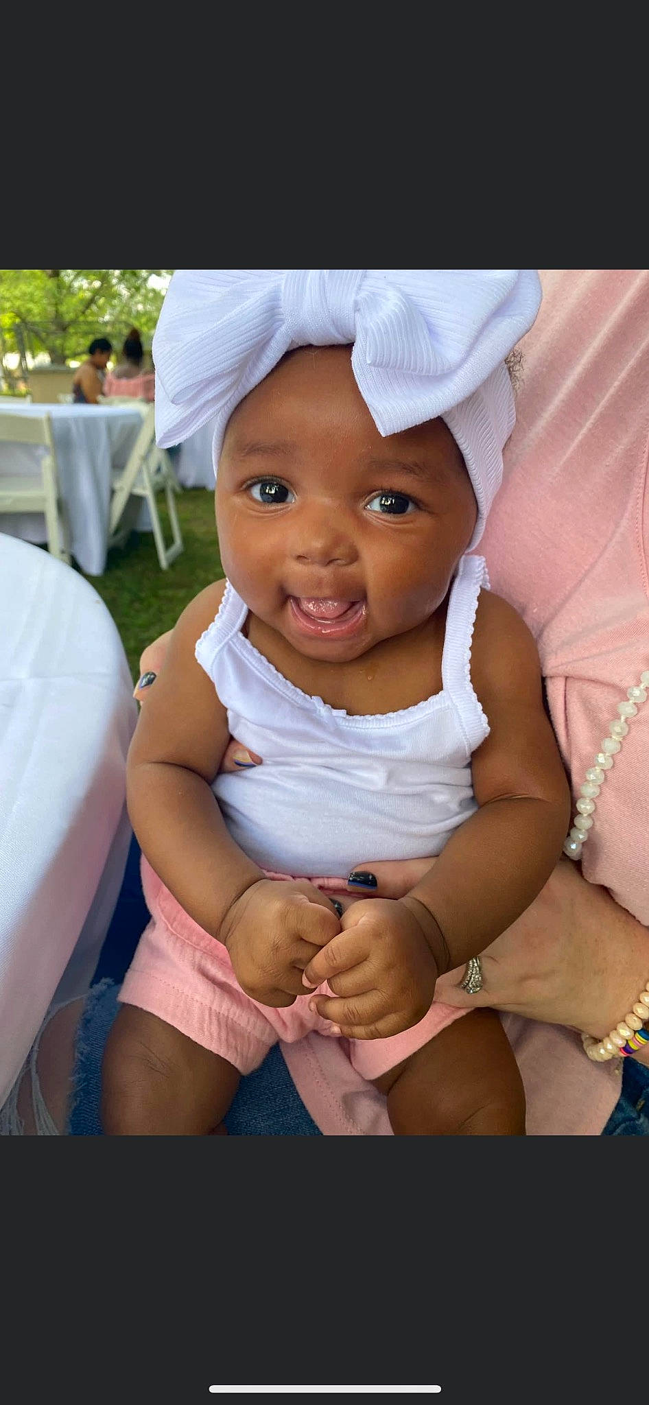 Leilani joined the competition — help win amazing prizes! abdomen, baby, baby_toddler_clothing, beauty, cap, child, fun, gesture, happy, headwear, human_leg, knee, nail, person, pink, sitting, skin, smile, thigh, thumb