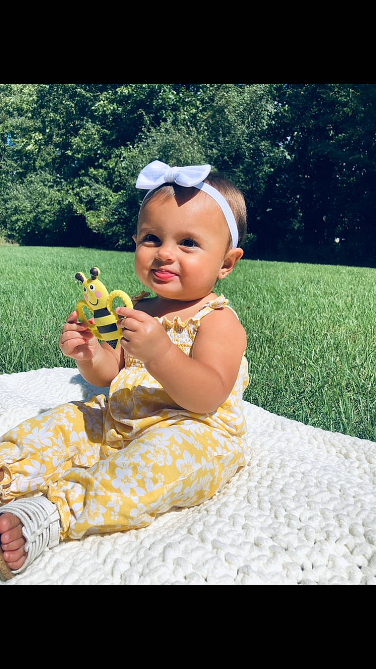 Kalli joined the competition — help win amazing prizes! baby, baby_toddler_clothing, child, flash_photography, fruit, fun, grass, happy, headpiece, joy, leisure, people_in_nature, person, plant, play, recreation, sitting, smile, toddler, toy