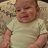 Mason joined the competition — help win amazing prizes! baby, child, infant, smiling, portrait, indoors, sitting, onesie, green_clothing, couch, pillow, blanket, home, cozy, brown_hair, blue_eyes, close_up, happy, reclining, photography