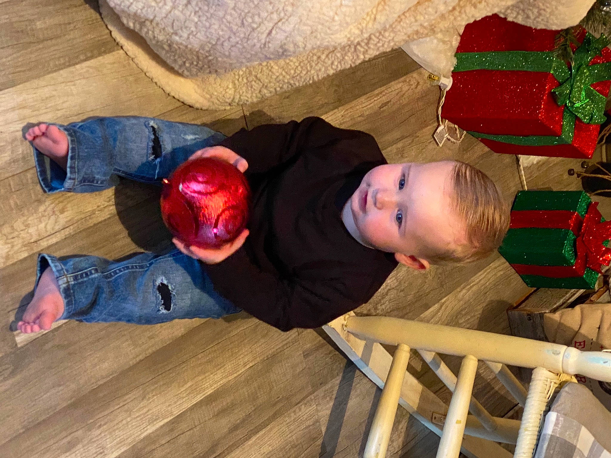 Aiden joined the competition — help win amazing prizes! baby, baby_toddler_clothing, child, clothing, comfort, event, flooring, fun, hardwood, holiday, lap, pattern, people, person, play, sitting, smile, toddler, varnish, wood