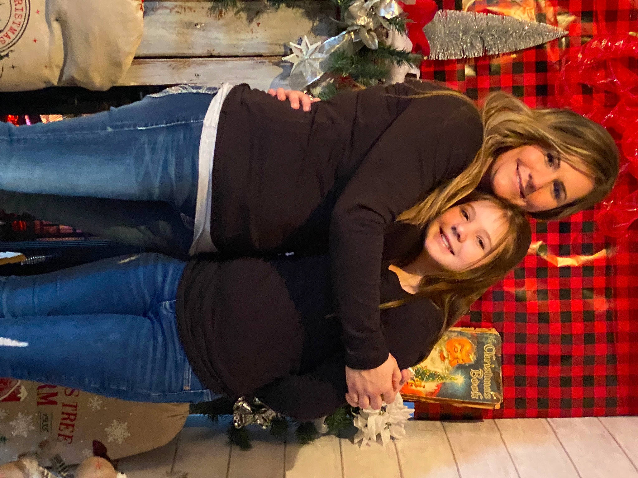 Mackenzie joined the competition — help win amazing prizes! clothing, event, flooring, fun, happy, human_leg, jeans, joy, knee, lap, orange, pattern, person, plaid, shoe, sitting, street_fashion, suit, tartan, thigh