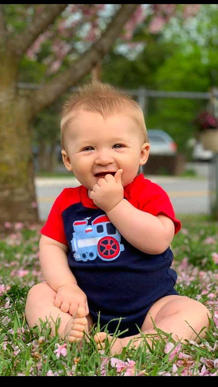 Abraham joined the competition — help win amazing prizes! baby, cheek, child, facial_expression, finger, fun, grass, happy, joy, person, photography, plant, play, sitting, skin, smile, summer, toddler