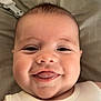 Luca Allan Hendrix joined the competition — help win amazing prizes! baby, smiling, face, tongue, chubby_cheeks, close_up, infant, cute, happy, white_clothing, lying_down, skin, head, eyes, mouth, expression, soft_background, indoor, person, child