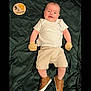baby, infant, child, lying_down, blanket, quilted, clothing, white_shirt, beige_shorts, mittens, brown_shoes, milestone_sign, winnie_the_pooh, piglet, smiling, portrait, indoors, cute, happy, three_months