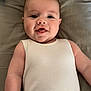 Luca Allan Hendrix is registered to the contest to win money with this photo: baby, infant, smiling, face, onesie, drool, bed, pacifier, pacifier_clip, skin, child, cute, lying_down, white_clothing, happy, young_child, indoors, person, head, arms