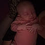 Catalyna participe au concours pour gagner de l'argent avec cette photo : baby, infant, sleeping, pink_clothing, hands, diaper, dark, shadow, floral_pattern, peaceful, newborn, person, resting, cute, indoor, soft_light, portrait, child, human, toddler