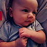 Ash is registered to the contest to win money with this photo: baby, infant, child, blanket, clothing, hands, face, portrait, cute, soft, cozy, indoors, newborn, closeup, expression, sleeping_bag, fisher_price, pajamas, resting, comfort