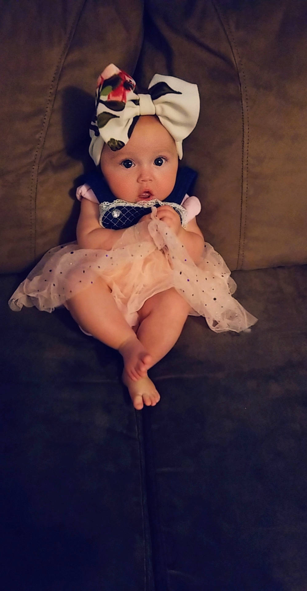 Annalisa is registered to the contest to win money with this photo: baby, baby_products, child, costume, doll, fictional_character, hair_accessory, headgear, headwear, joint, leg, person, pink, product, skin, toddler, toy