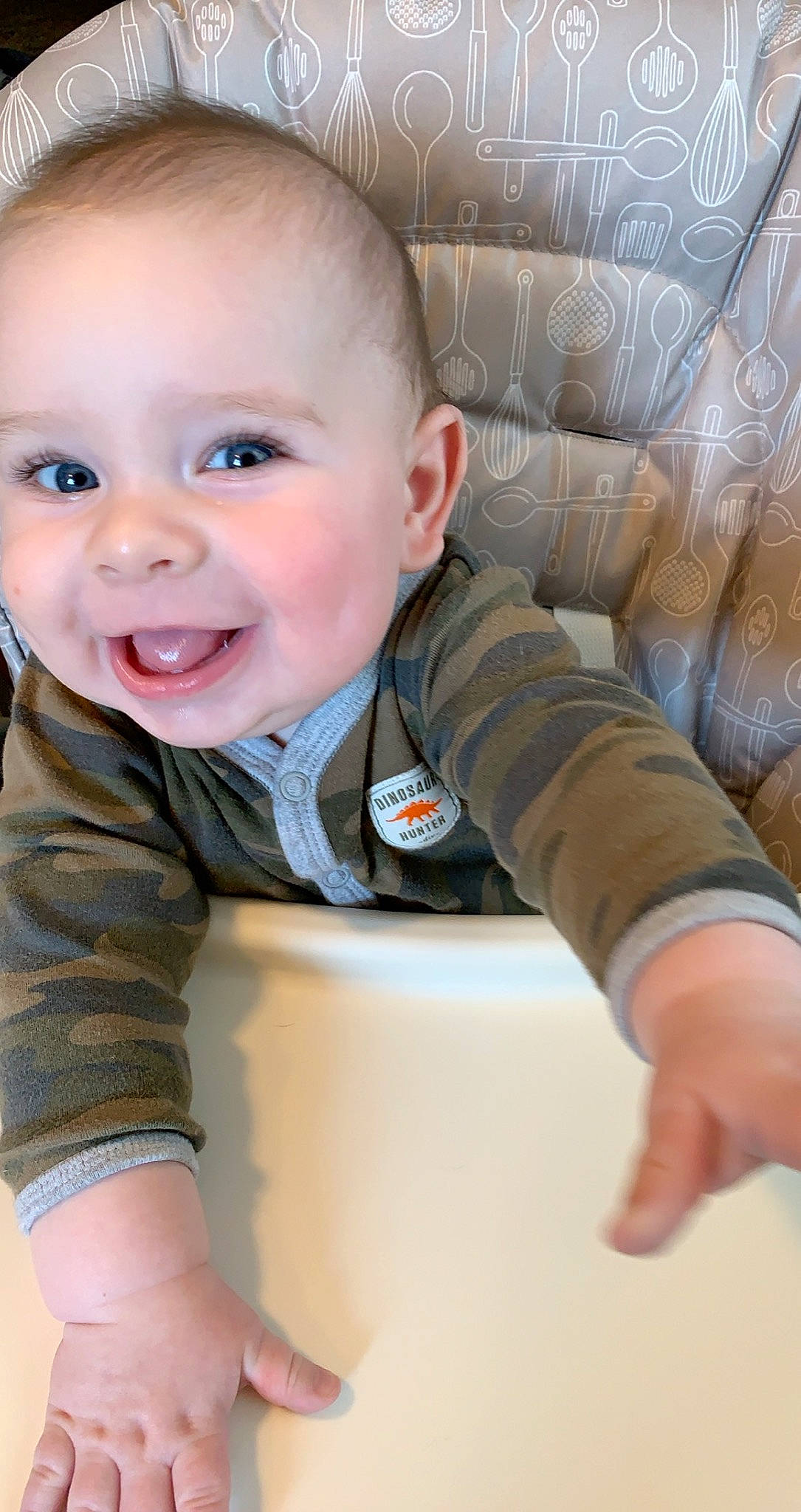 Caden is registered to the contest to win money with this photo: baby_toddler_clothing, cheek, child, comfort, ear, eye, finger, forehead, hand, head, iris, joy, lip, mouth, nose, organ, person, skin, sleeve, smile