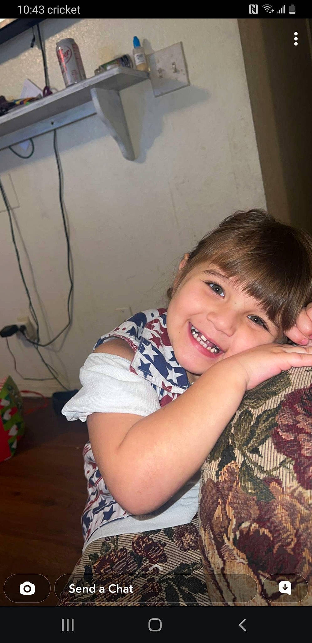 Cierra is registered to the contest to win money with this photo: abdomen, arm, cheek, comfort, elbow, event, eye, fun, gesture, happy, iris, joy, mouth, nose, person, skin, smile, t_shirt, thumb, toddler