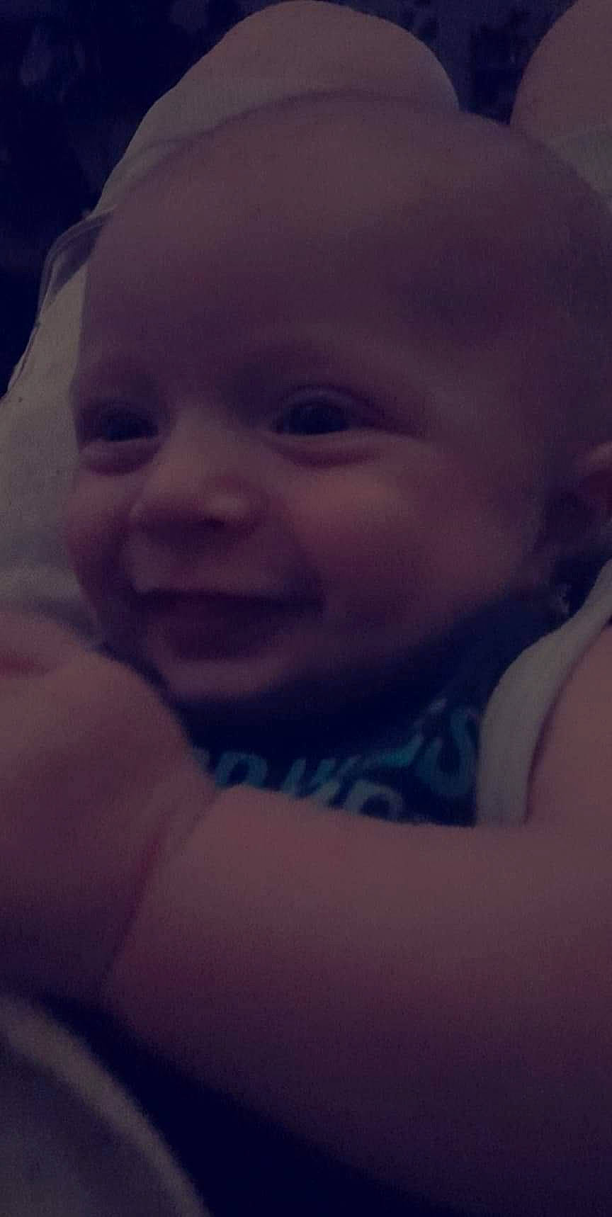 Oaklei is registered to the contest to win money with this photo: baby, cheek, cloud, eyebrow, finger, forehead, gesture, happy, human_body, iris, jaw, lip, mammal, mouth, nose, person, skin, sky, smile, toddler