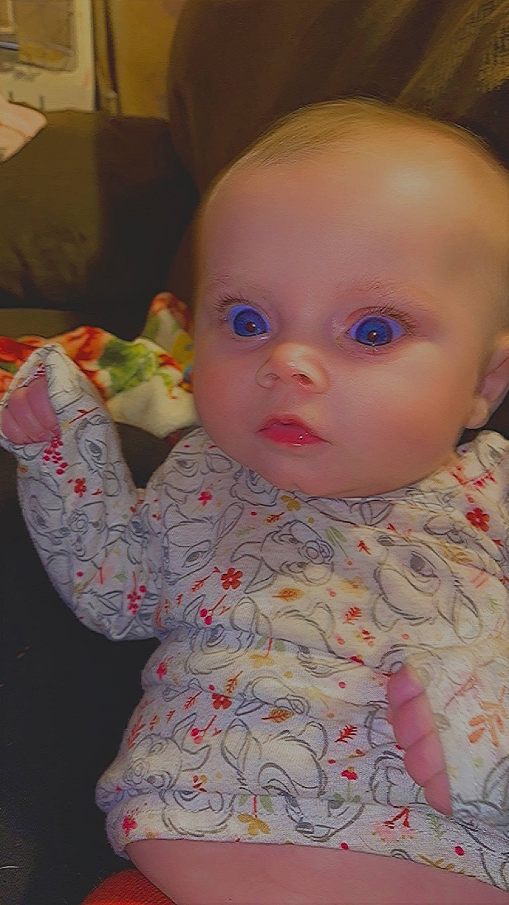 Marceline is registered to the contest to win money with this photo: baby, baby_toddler_clothing, cheek, child, chin, ear, eye, eyebrow, eyelash, fun, human_body, iris, lip, mouth, nose, pattern, person, sitting, skin, sleeve