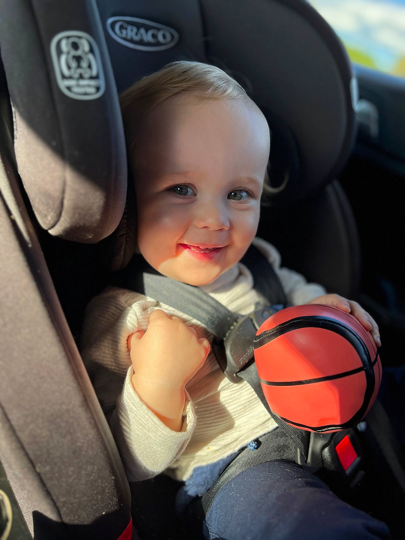 Eli joined the competition — help win amazing prizes! auto_part, automotive_design, automotive_exterior, ball, basketball, car_seat, car_seat_cover, child, comfort, eye, happy, head_restraint, motor_vehicle, person, personal_luxury_car, smile, sports_equipment, steering_wheel, toddler, vehicle_door