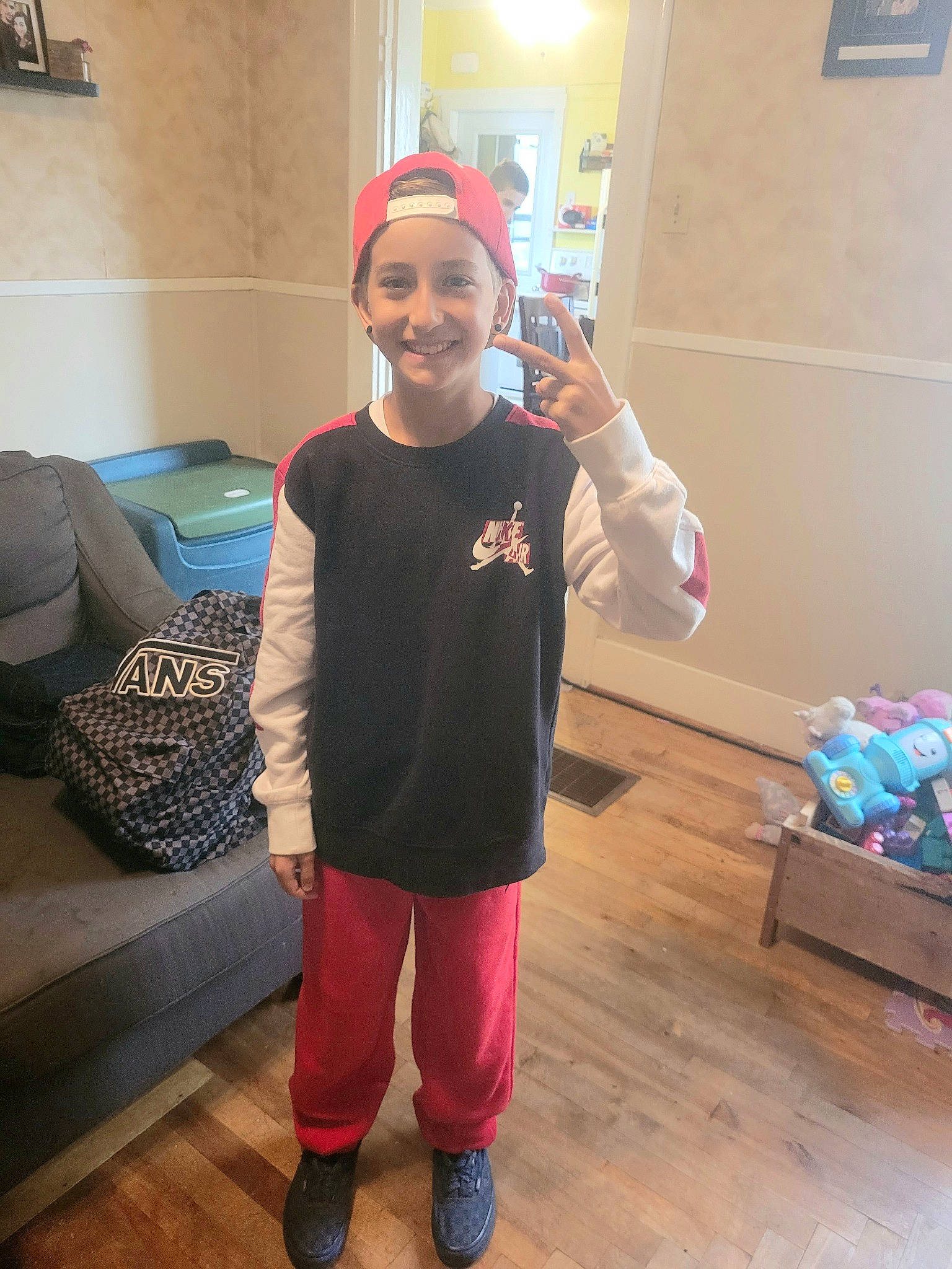 Jayden joined the competition — help win amazing prizes! cap, child, costume, event, fictional_character, flooring, fun, happy, hardwood, hat, headwear, holiday, joy, person, personal_protective_equipment, play, room, sleeve, smile, sportswear