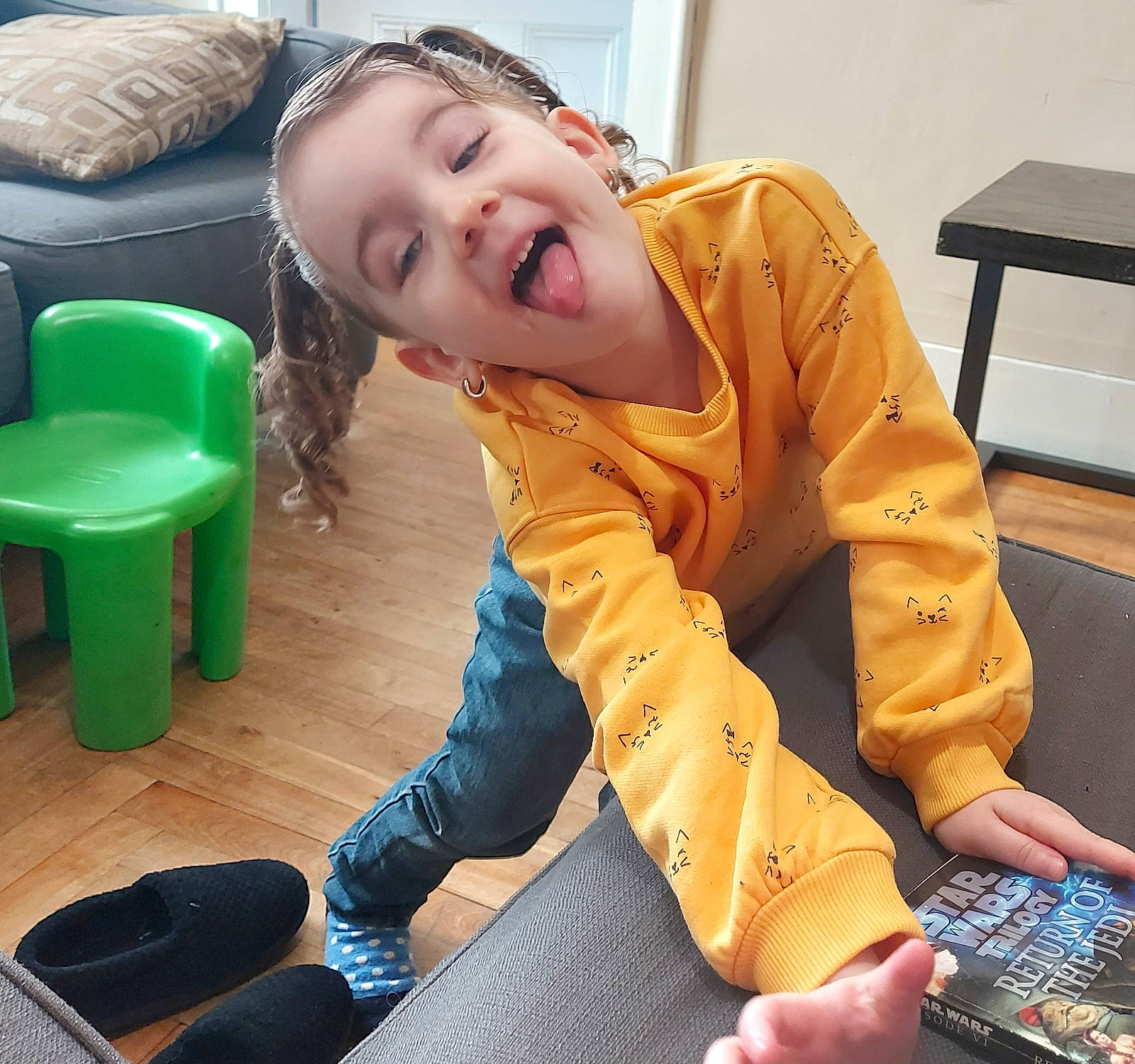 Jayme joined the competition — help win amazing prizes! baby_toddler_clothing, child, comfort, electric_blue, flooring, fun, happy, knee, laugh, leisure, person, play, room, sitting, sleeve, smile, standing, tablet_computer, thigh, toddler