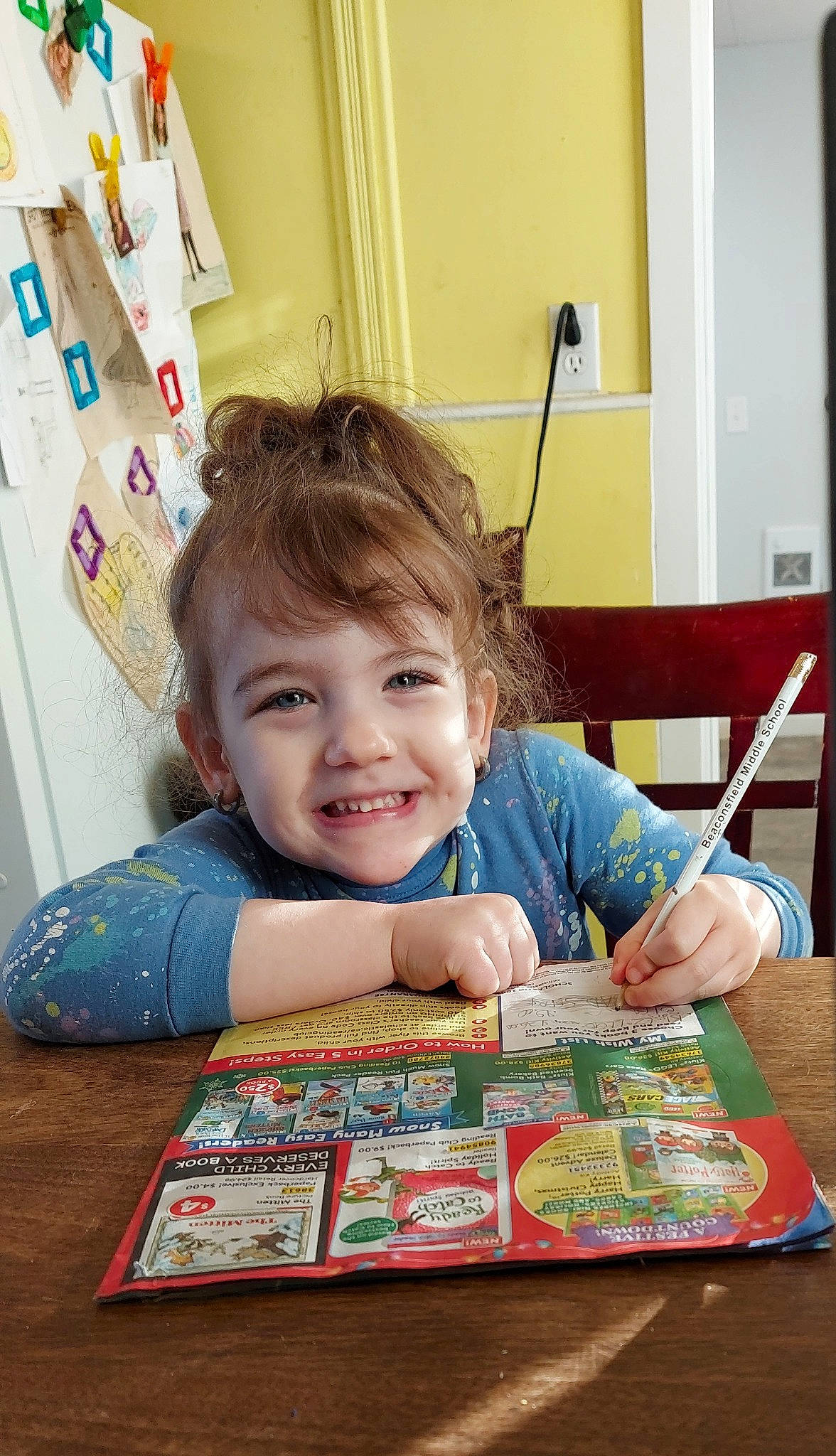 Jayme joined the competition — help win amazing prizes! art, book, chair, child, desk, flooring, fun, illustration, joy, learning, person, play, publication, room, sharing, sitting, smile, stationery, table, toddler