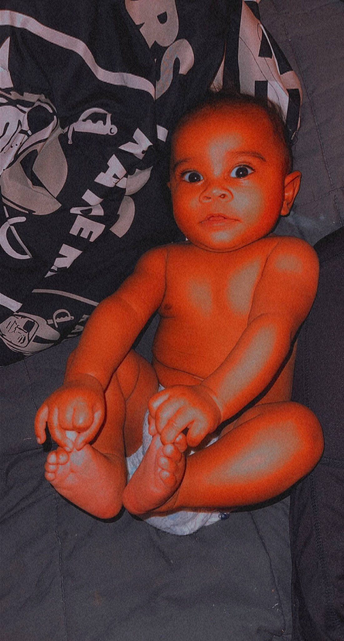 Joziah is registered to the contest to win money with this photo: arm, baby, cheek, chest, elbow, eyebrow, finger, gesture, hand, joint, leg, lip, mouth, muscle, nose, person, skin, stomach, thigh, thumb