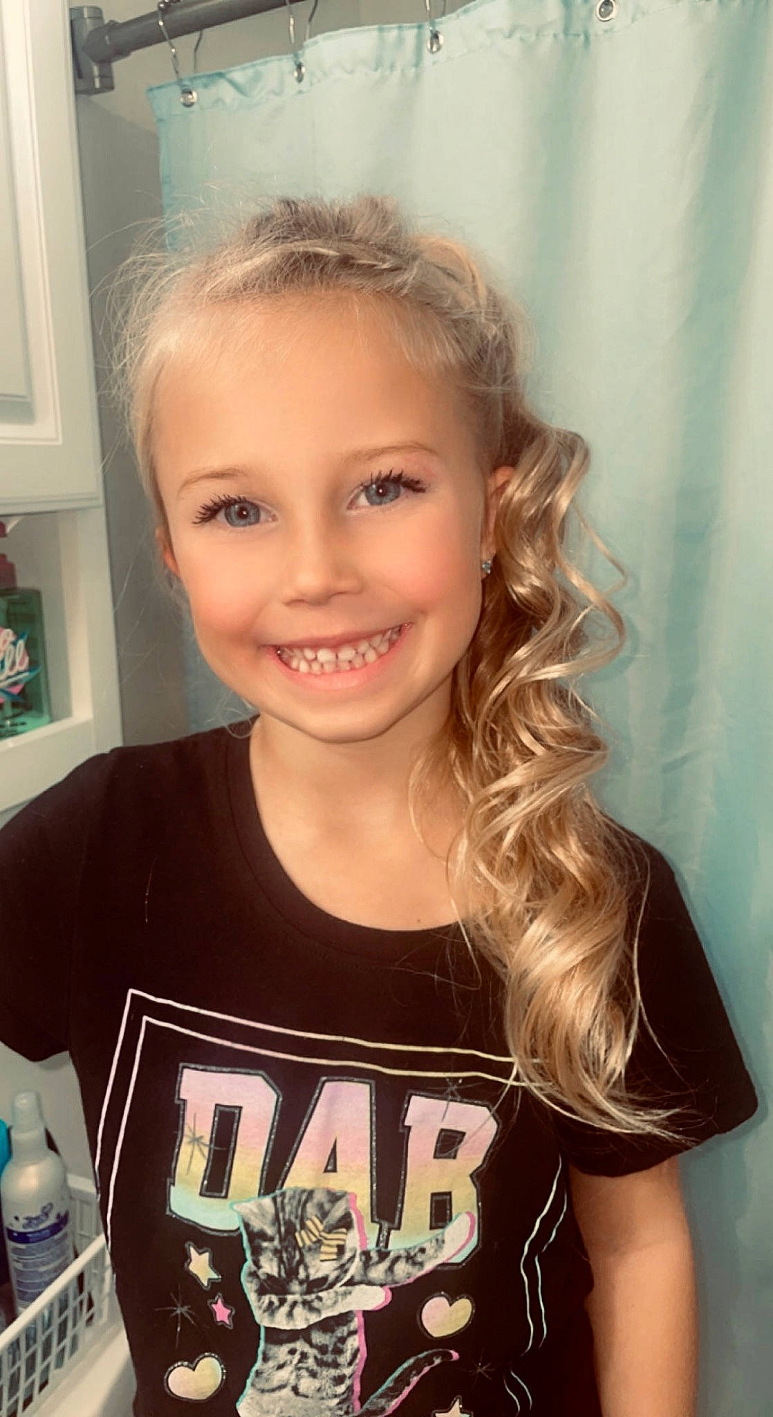 Kyla is registered to the contest to win money with this photo: cheek, chin, cool, eyebrow, eyelash, face, facial_expression, flash_photography, forehead, hairstyle, happy, iris, joy, lip, neck, organ, person, plastic_bottle, shoulder, sleeve