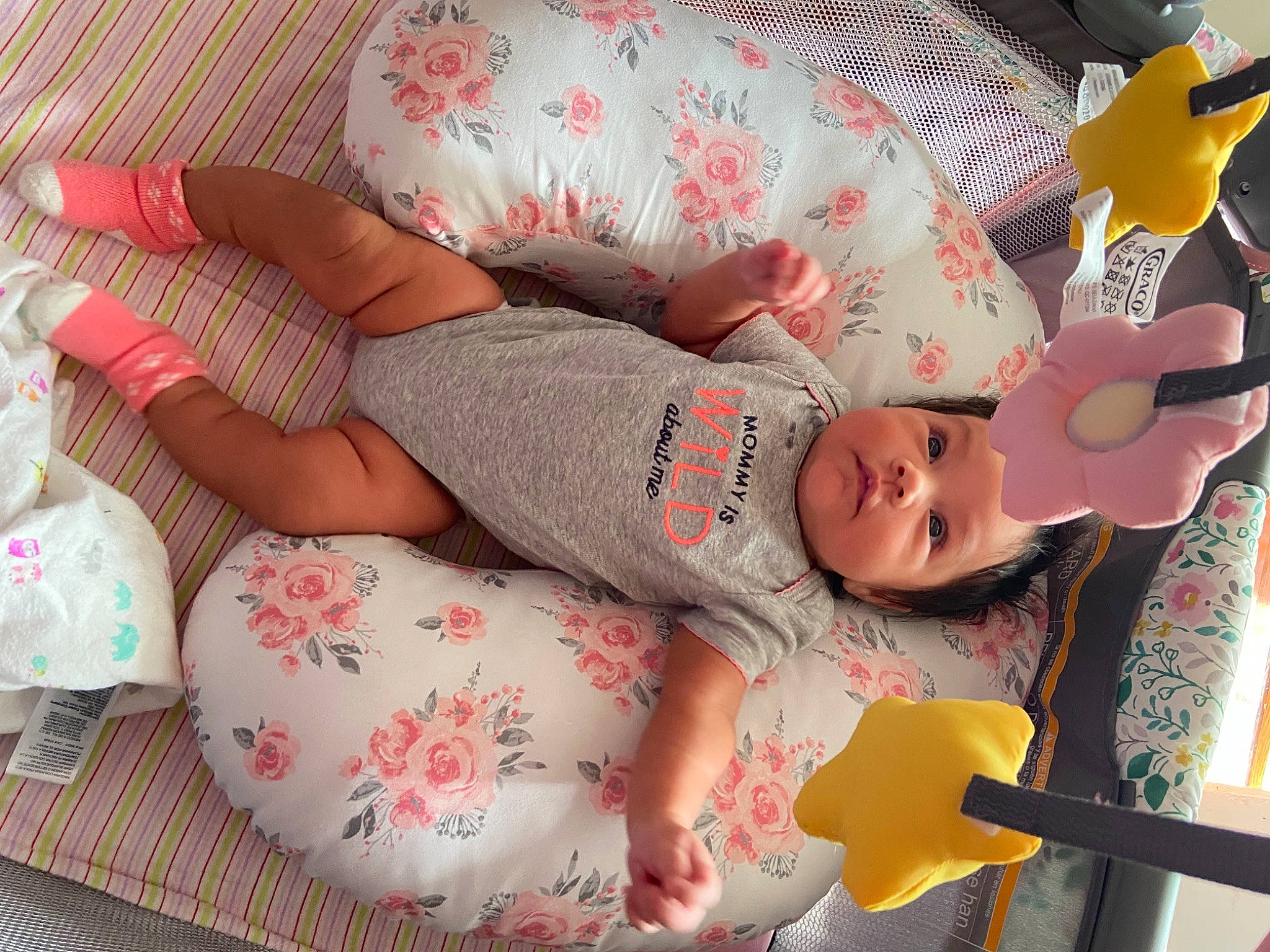 Alicia joined the competition — help win amazing prizes! baby, baby_products, baby_toddler_clothing, child, comfort, flesh, hat, head, headgear, human_leg, linens, nail, pattern, person, pink, room, skin, sleeve, textile, thigh