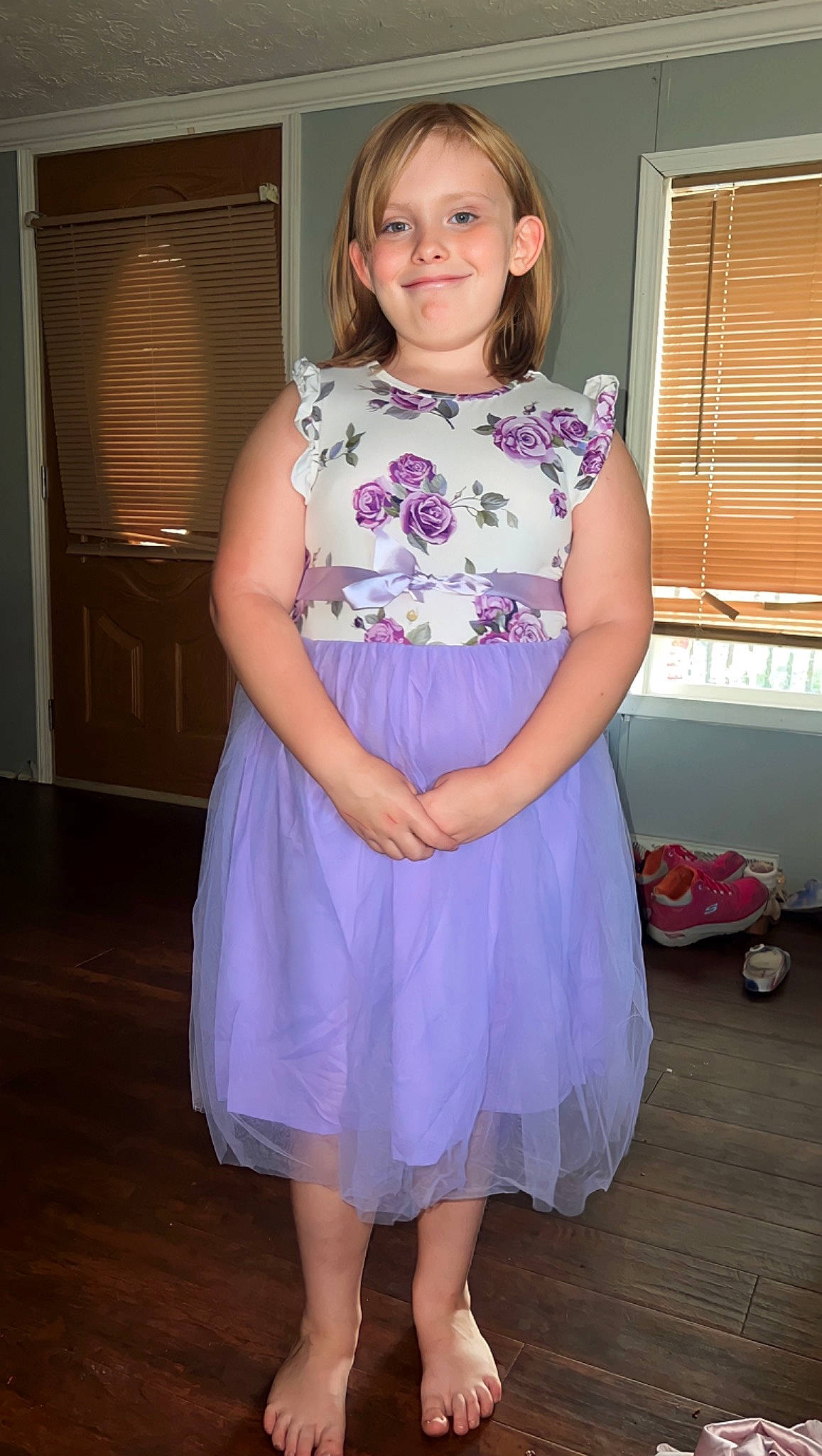 Makenna is registered to the contest to win money with this photo: blond, brown_hair, cocktail_dress, day_dress, dress, electric_blue, embellishment, event, fashion_design, flooring, formal_wear, happy, jewellery, joy, one_piece_garment, person, pink, purple, smile, trunk