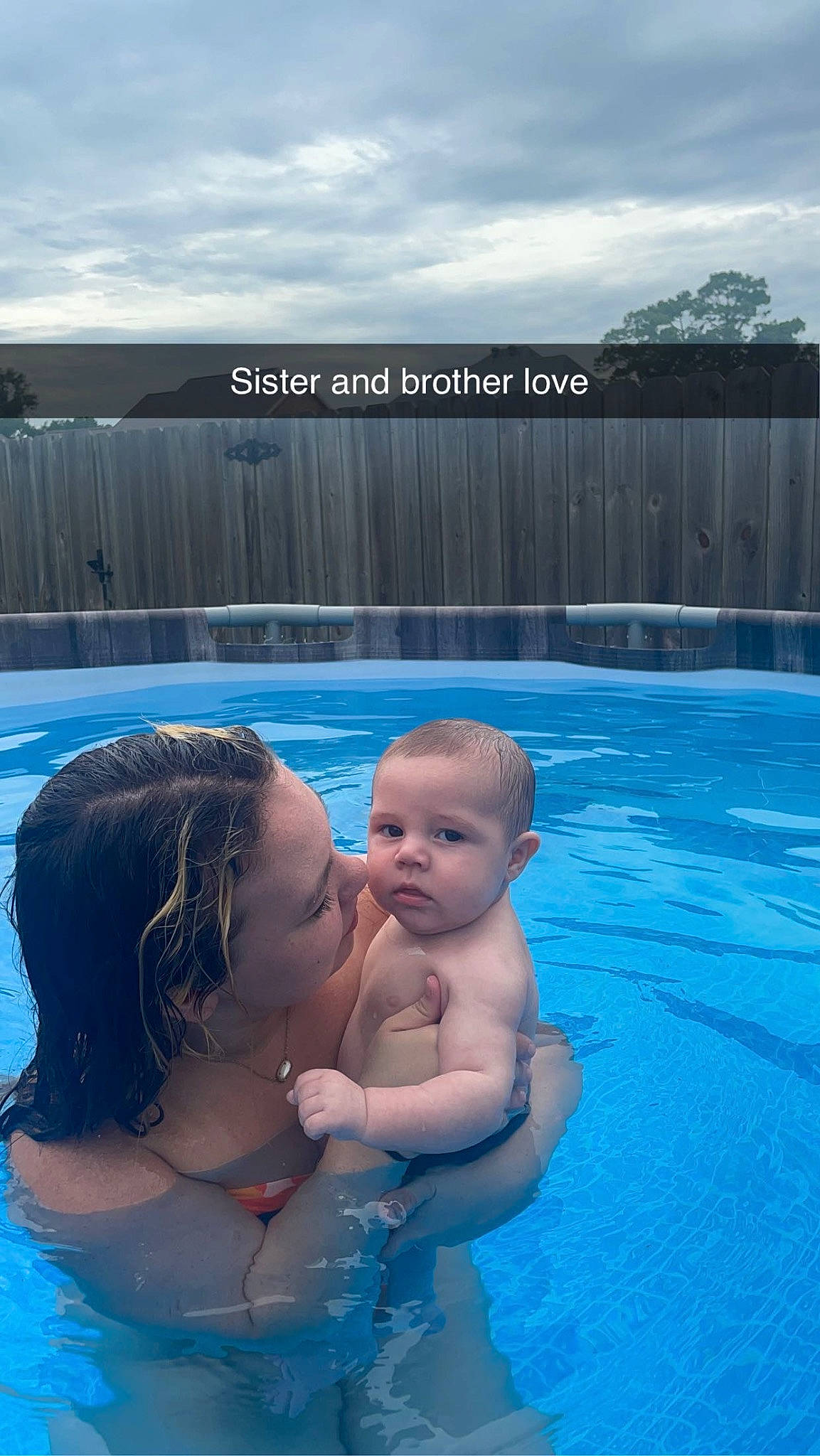 Kohen Luke is registered to the contest to win money with this photo: aqua, azure, baby, blue, body_of_water, cloud, electric_blue, fun, gesture, happy, human_body, kiss, leisure, people_in_nature, person, recreation, sky, summer, swimming_pool, toddler