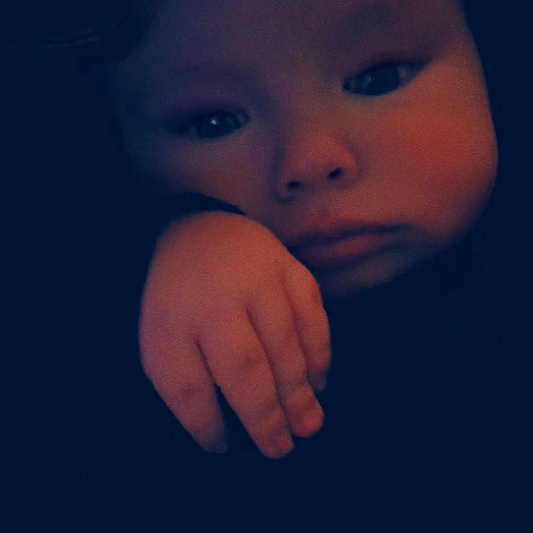 Michael is registered to the contest to win money with this photo: accessories, baby, bodypart, clothing, face, finger, fist, hand, head, hoodie, jewelry, knitwear, mouth, newborn, person, photography, portrait, ring, sweater, sweatshirt