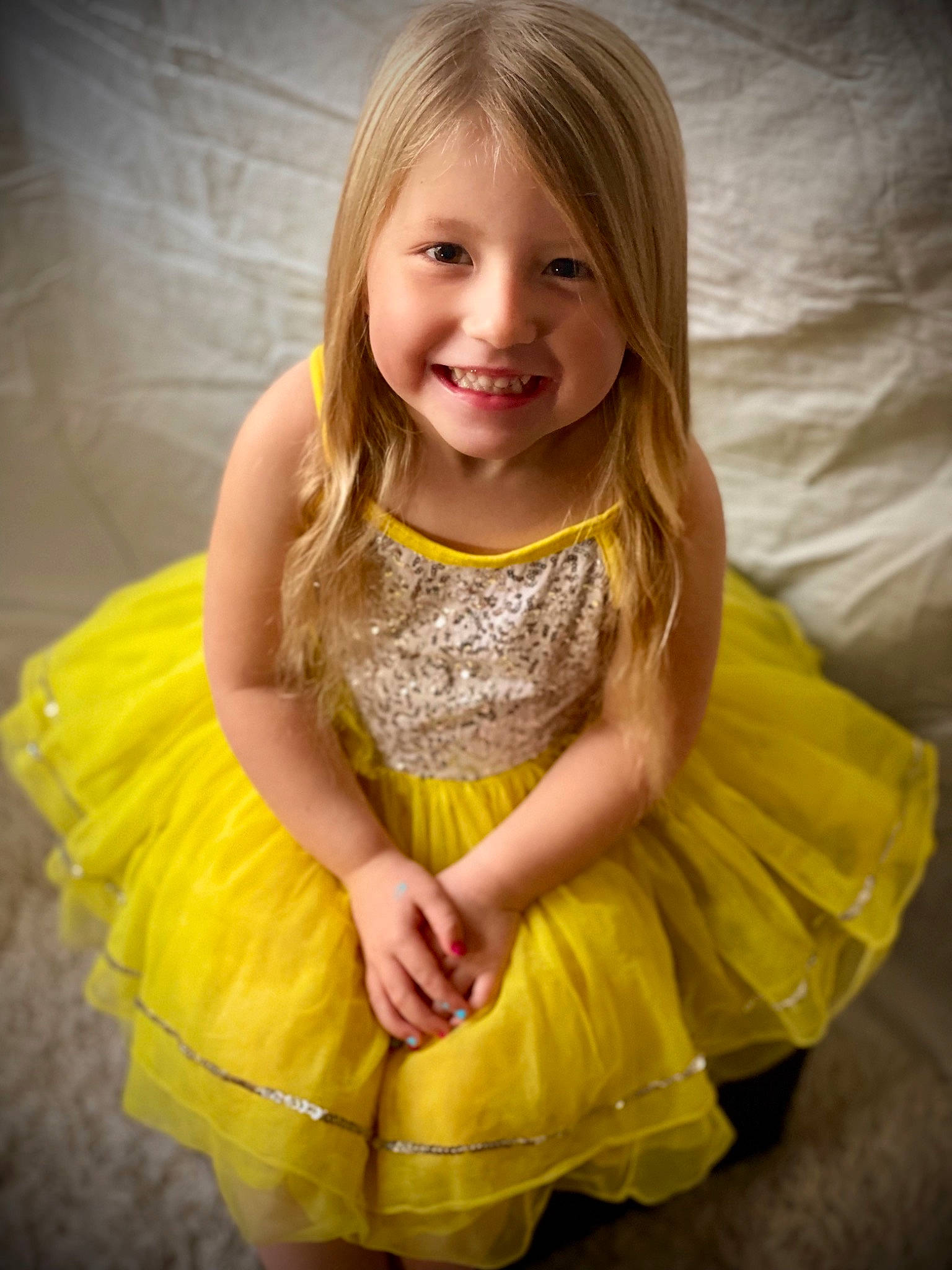 Jovannah is registered to the contest to win money with this photo: arm, baby_toddler_clothing, blond, brown_hair, day_dress, dress, embellishment, flash_photography, fun, happy, human_leg, joy, magenta, peach, person, ruffle, shoulder, sitting, sleeve, smile