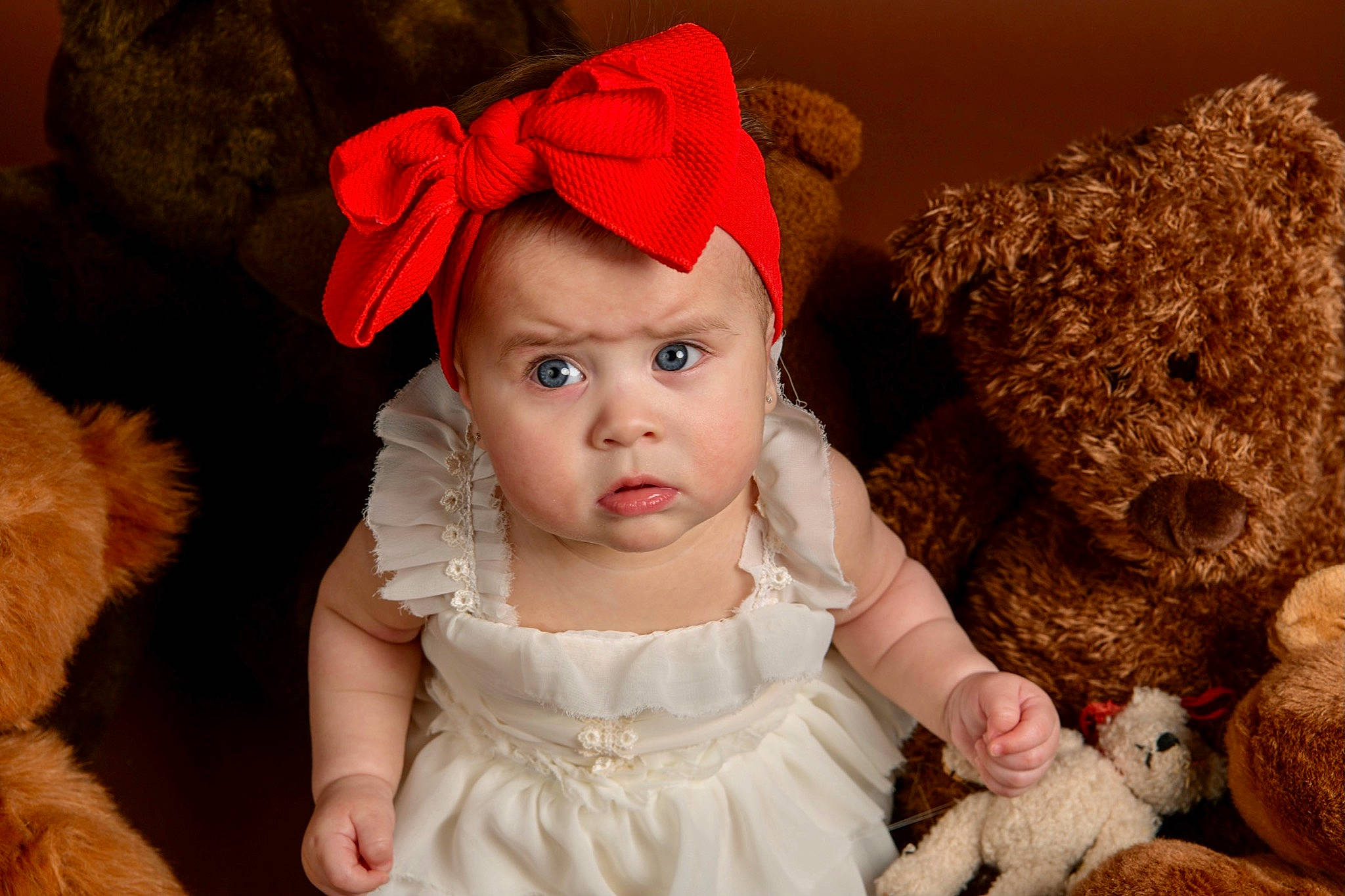 Galilea is registered to the contest to win money with this photo: baby, baby_toddler_clothing, cap, cheek, child, costume_hat, face, fawn, happy, head, headgear, headpiece, headwear, lip, mammal, person, pink, skin, textile, toddler