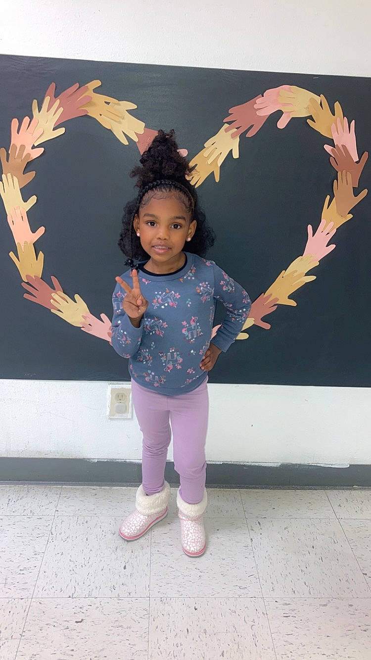 Aminah joined the competition — help win amazing prizes! art, barefoot, child, flip_flops, foot, fun, gesture, happy, leisure, magenta, pattern, person, pink, sandal, sleeve, sock, standing, t_shirt, toddler, visual_arts