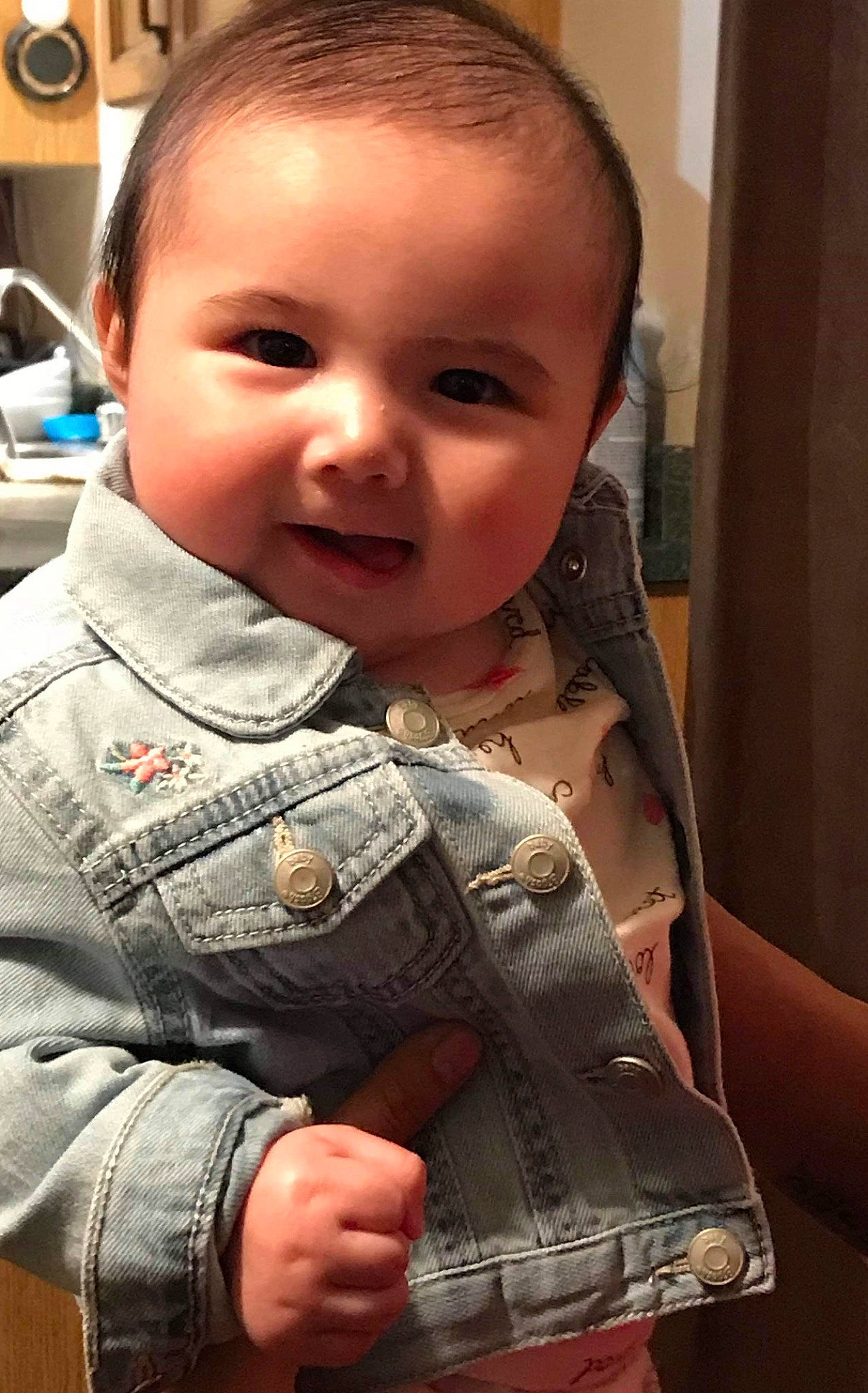 Collins is registered to the contest to win money with this photo: baby, cheek, child, chin, face, finger, head, nose, person, skin, smile, toddler