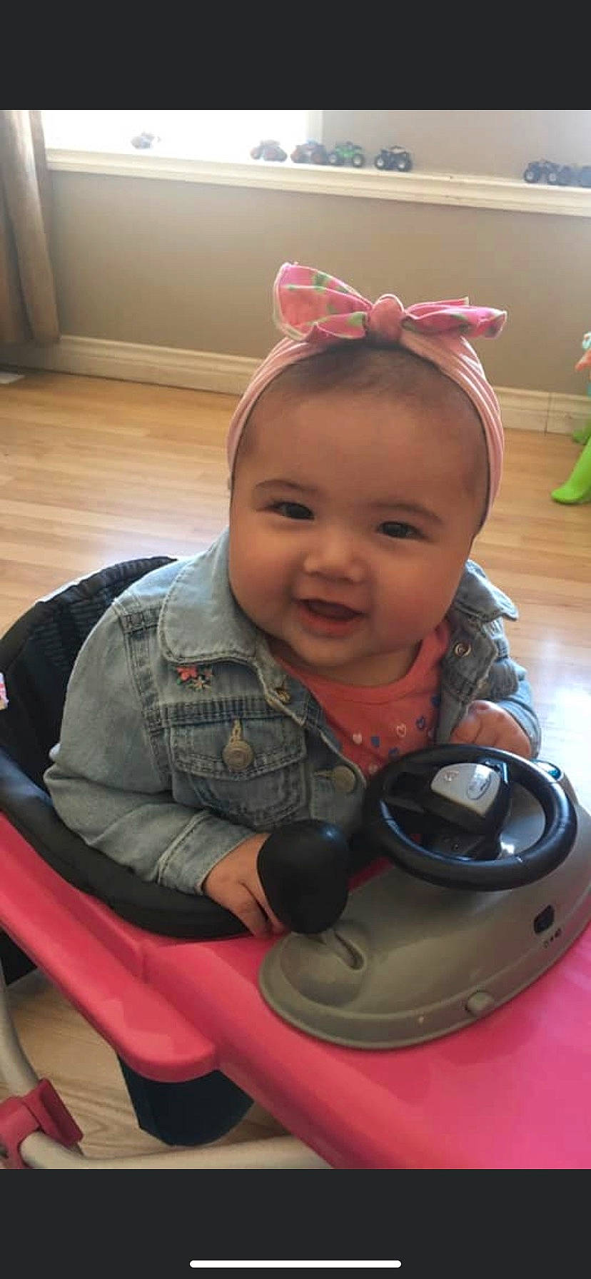 Collins is registered to the contest to win money with this photo: baby, cheek, child, ear, person, pink, play, product, sitting, skin, smile, toddler