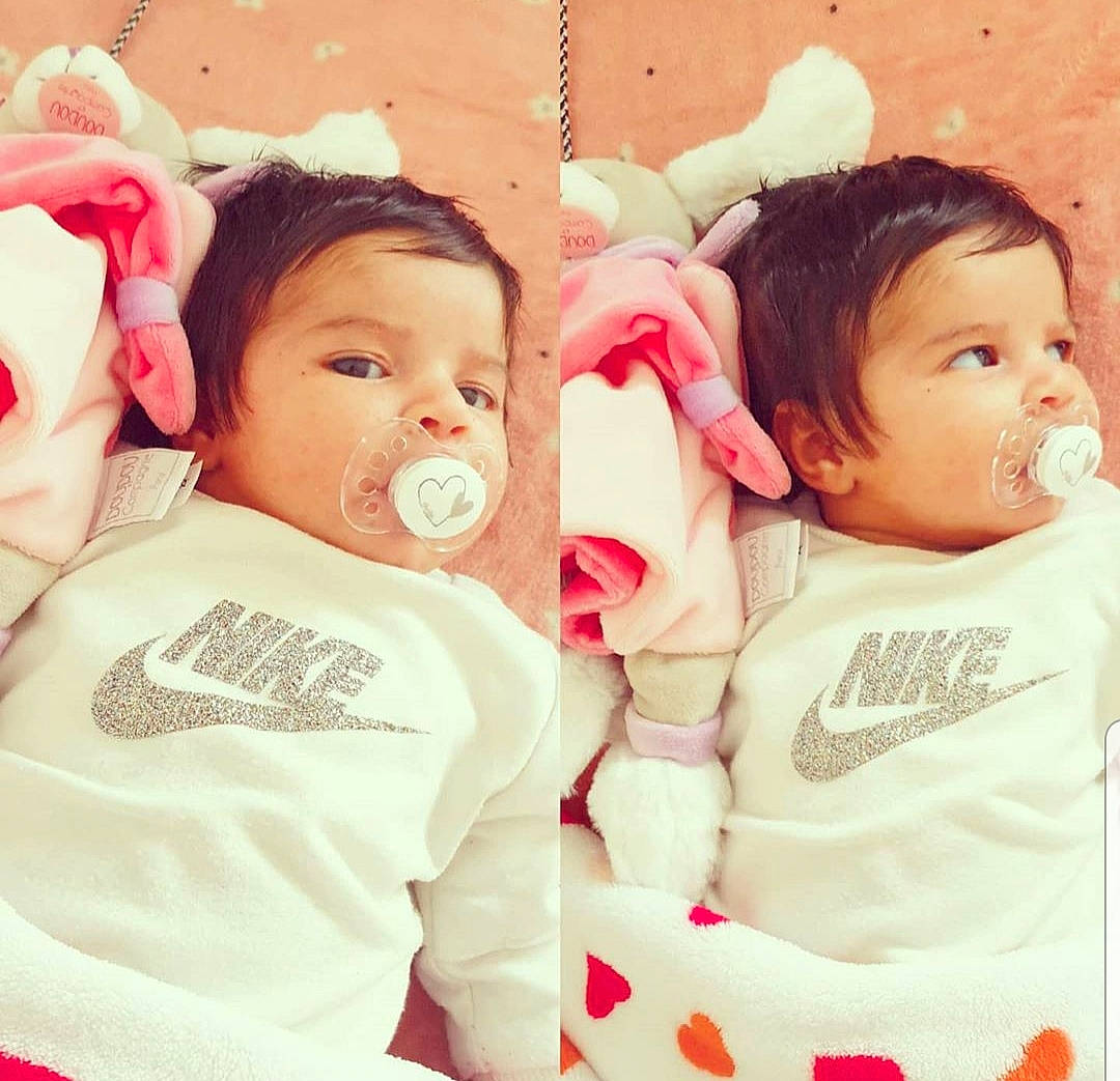 Kamilya participe au concours pour gagner de l'argent avec cette photo : baby, cheek, child, cool, ear, face, fun, gesture, happy, head, love, nose, person, pink, product, sibling, skin, smile, toddler