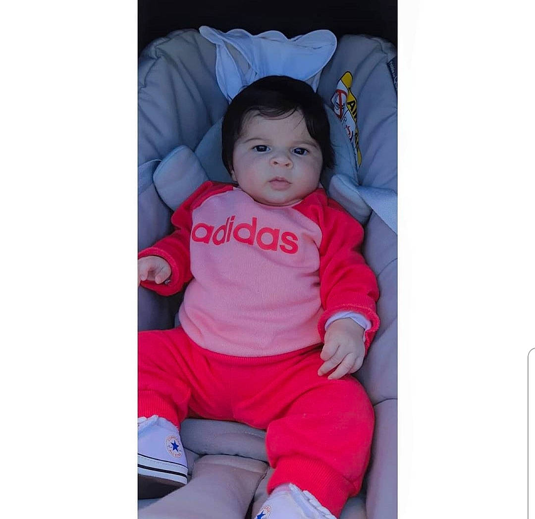 Kamilya participe au concours pour gagner de l'argent avec cette photo : baby, baby_products, baby_toddler_clothing, child, person, product, sleeve, smile, toddler