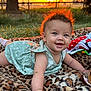 Aurora is registered to the contest to win money with this photo: baby, smiling, outdoor, sunset, grass, blanket, leopard_print, toy, child, happy, face, cute, nature, infant, portrait, green_dress, drool, sunlight, play, lying_down