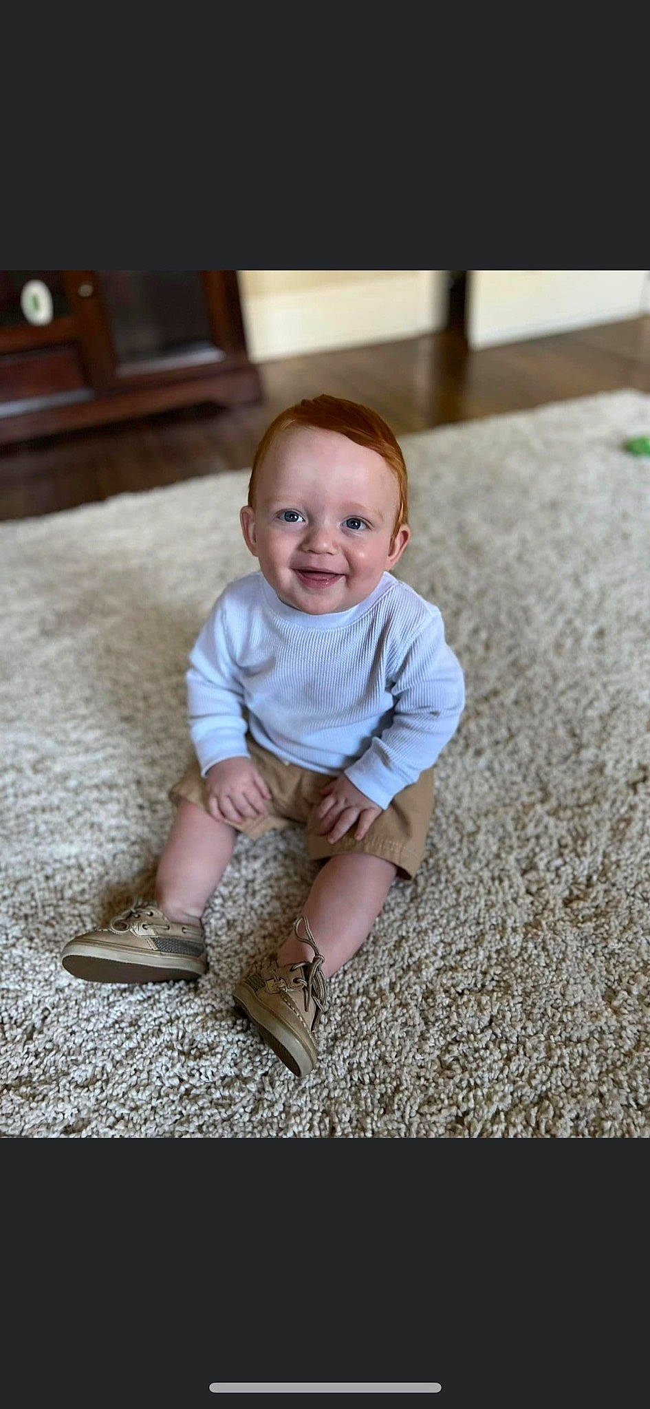 Jameson joined the competition — help win amazing prizes! baby, baby_toddler_clothing, child, eye, face, floor, flooring, fun, grass, happy, hardwood, head, human_leg, joy, knee, leg, person, sitting, sleeve, smile