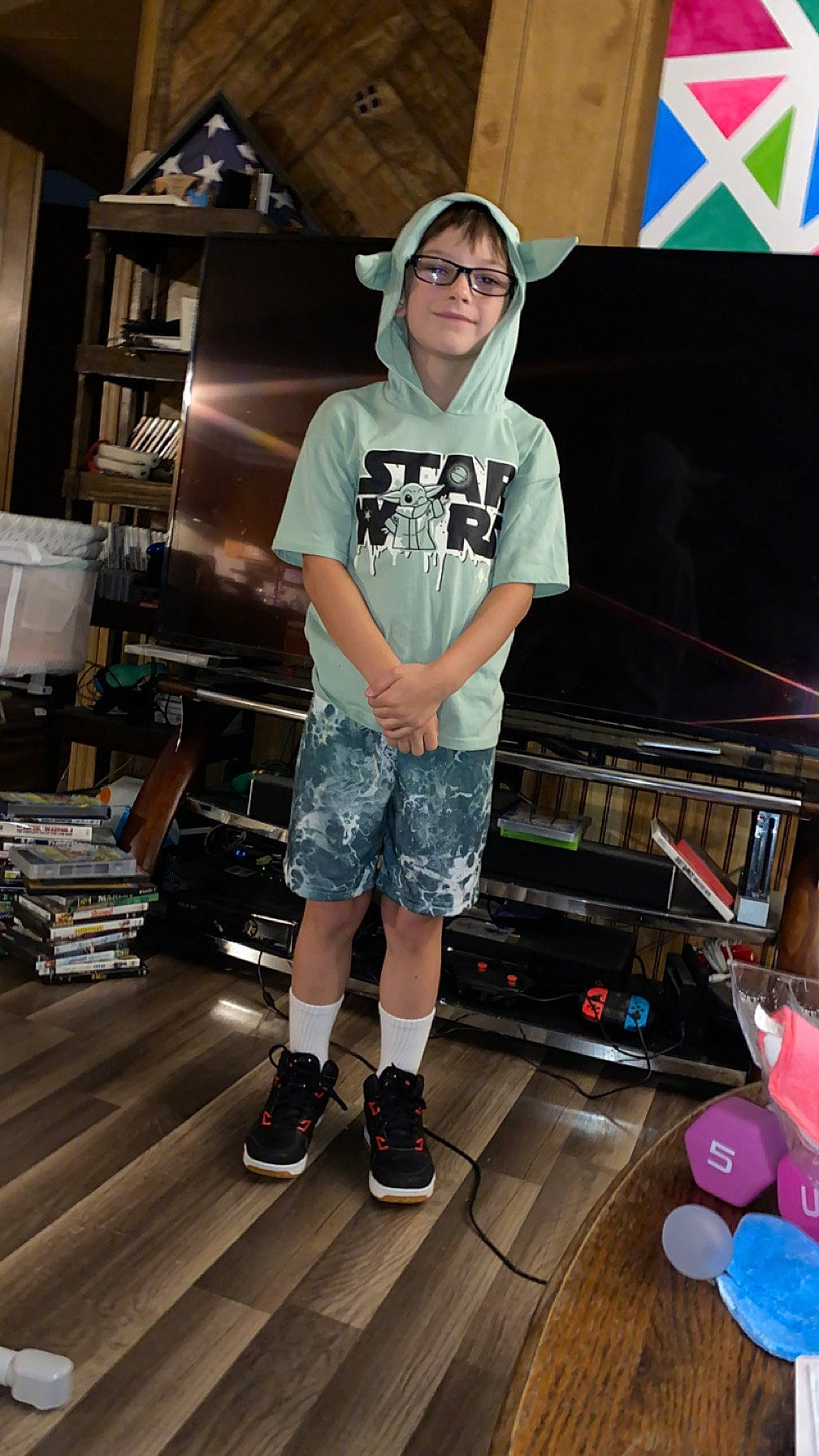 Jeremiah joined the competition — help win amazing prizes! automotive_design, balloon, event, eyewear, flooring, fun, human_leg, leg, pattern, person, personal_protective_equipment, room, shoe, shorts, sleeve, smile, sneakers, sportswear, standing, t_shirt