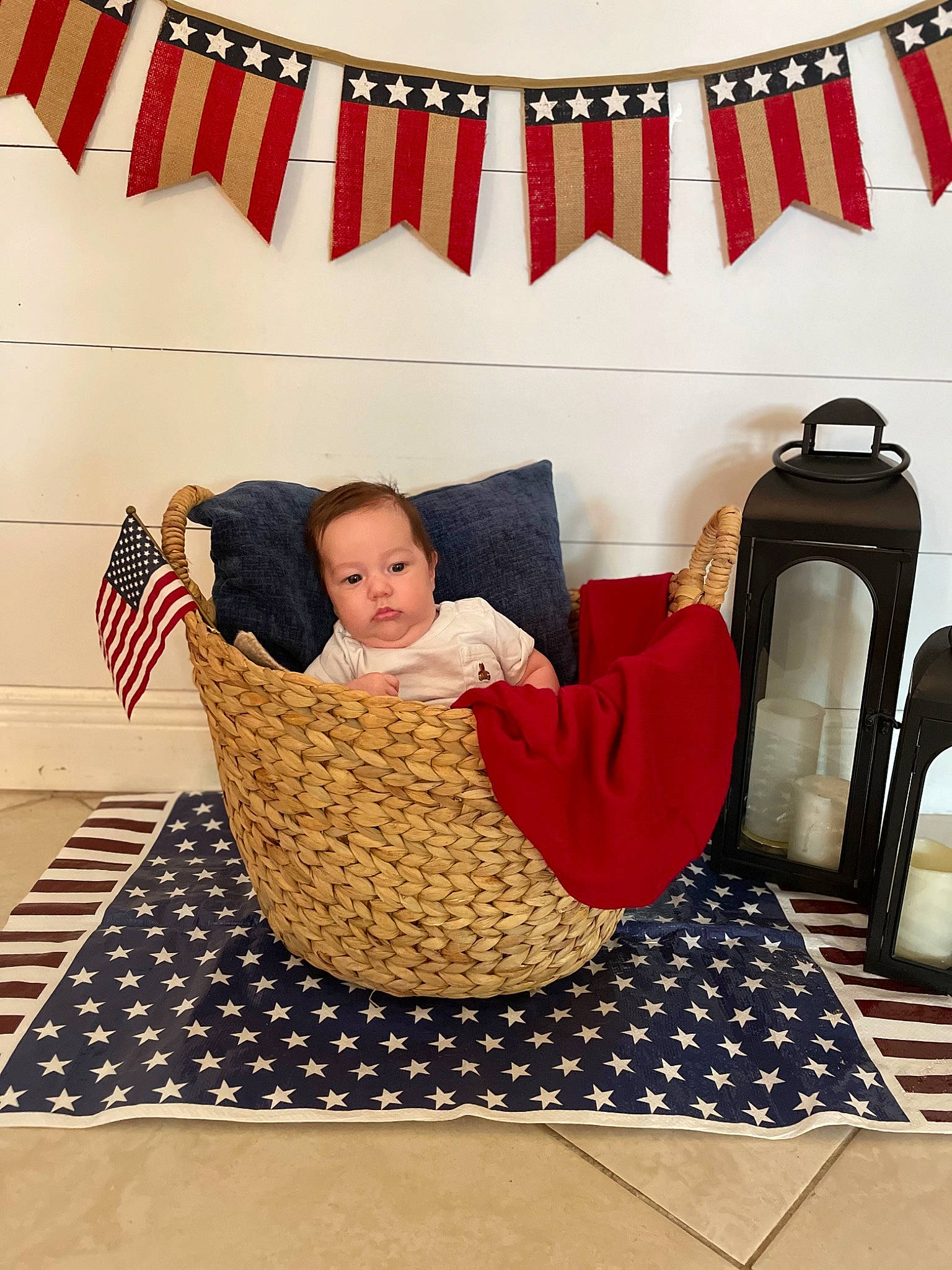 James is registered to the contest to win money with this photo: art, baby, carpet, comfort, curtain, event, flooring, interior_design, leisure, linens, living_room, magenta, pattern, person, rectangle, red, room, sitting, textile, toddler