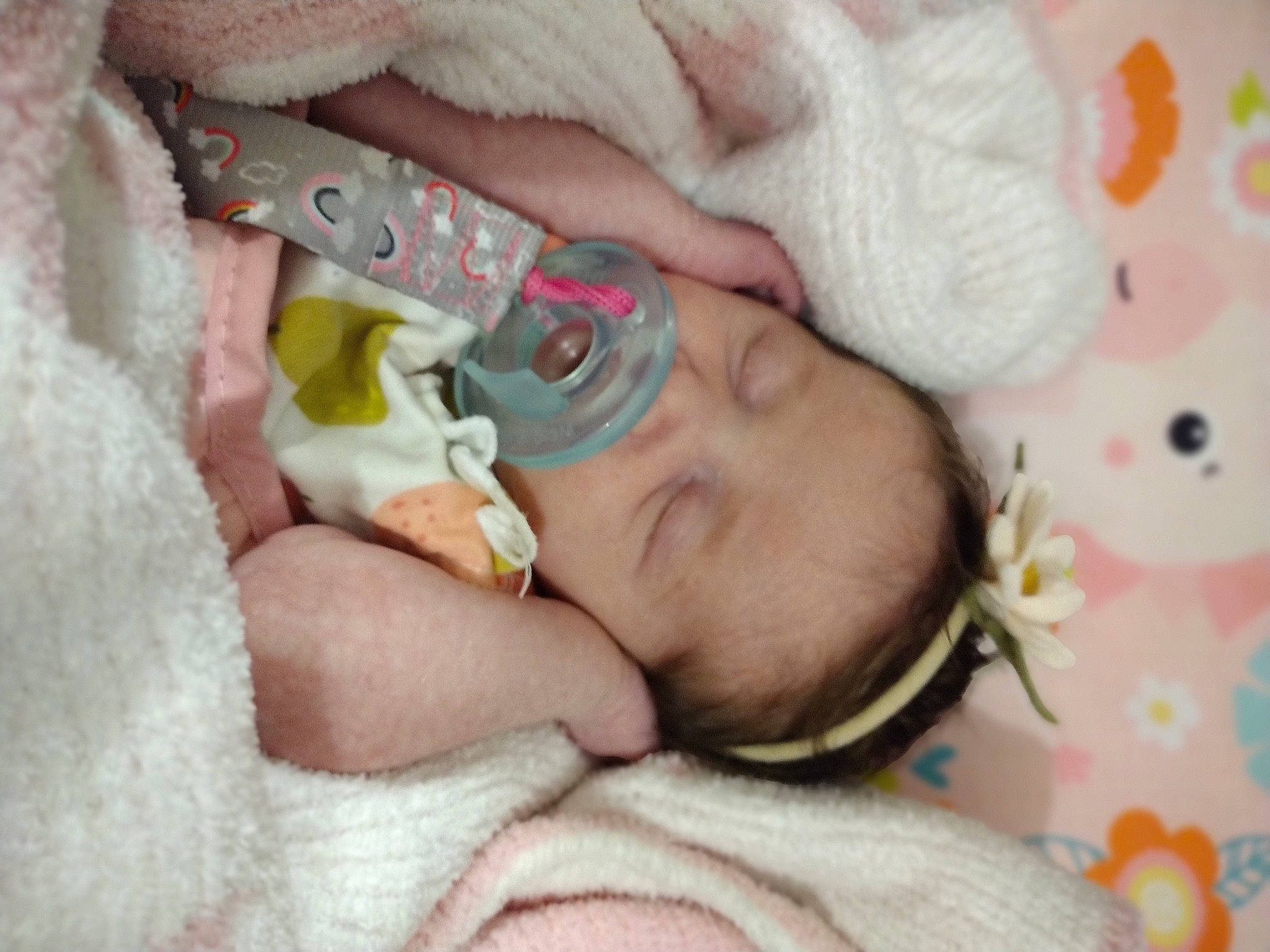 Emma is registered to the contest to win money with this photo: baby, baby_products, baby_sleeping, baby_toddler_clothing, cheek, comfort, dress, ear, eye, face, finger, hand, head, iris, linens, nail, nose, person, skin, sunglasses