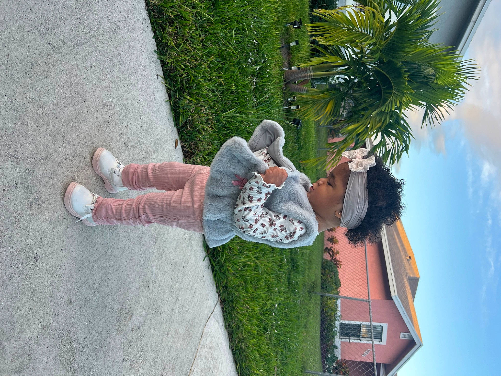 Leilana joined the competition — help win amazing prizes! arecales, asphalt, flowerpot, foot, fun, grass, headwear, houseplant, human_leg, knee, leisure, palm_tree, people_in_nature, person, plant, road_surface, sandal, sidewalk, sky, terrestrial_plant