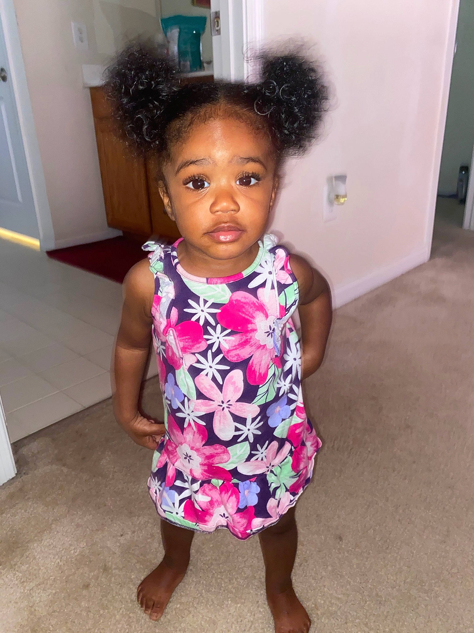 Aubri is registered to the contest to win money with this photo: black_hair, cheek, child, dress, face, hair, hairstyle, head, person, pink, shoulder, skin, smile, toddler