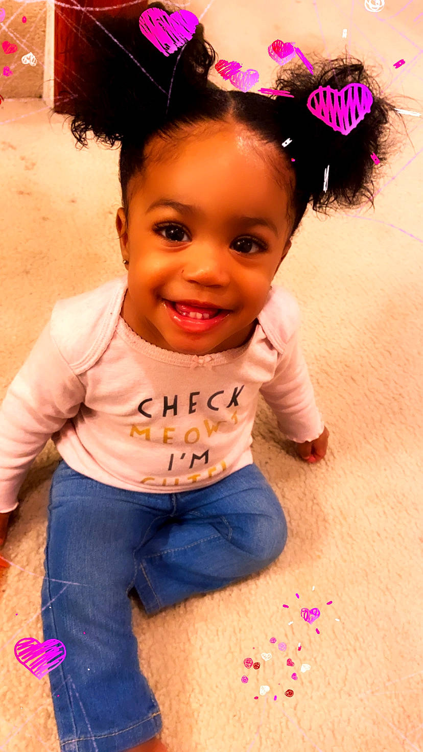 Aubri is registered to the contest to win money with this photo: baby, beauty, black_hair, cheek, child, child_model, face, forehead, fun, hair, hair_accessory, hairstyle, happy, head, joy, lip, person, photography, pink, skin