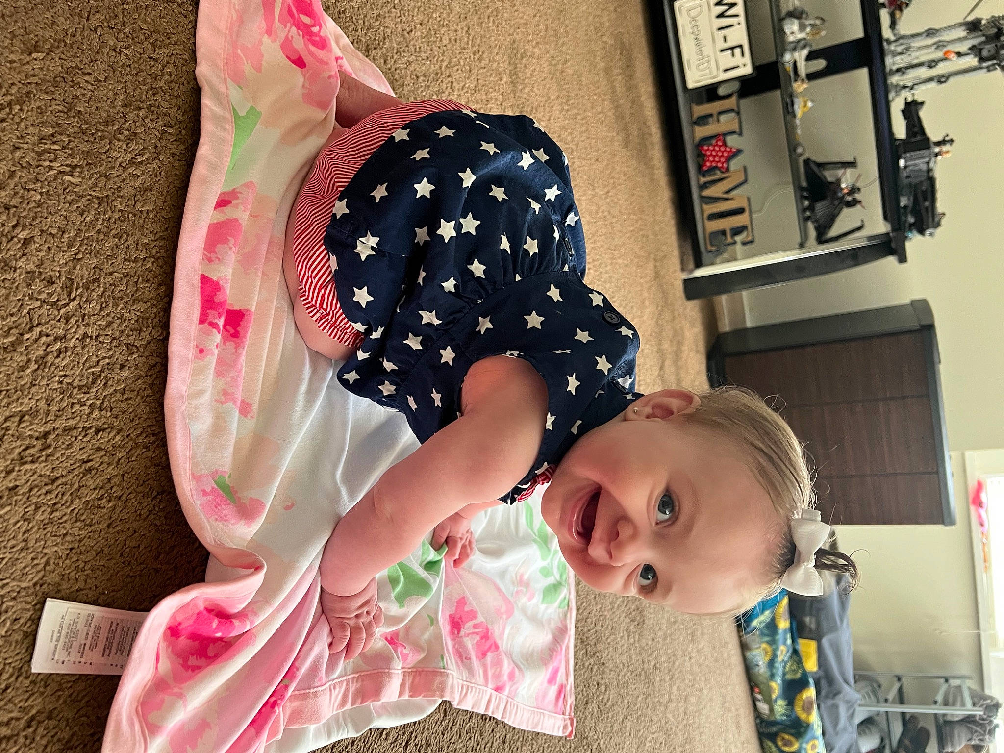 Paislei is registered to the contest to win money with this photo: baby, baby_products, baby_toddler_clothing, child, fashion_accessory, fun, happy, joy, kitchen_appliance, magenta, pattern, person, room, shelf, sleeve, smile, sunglasses, toddler
