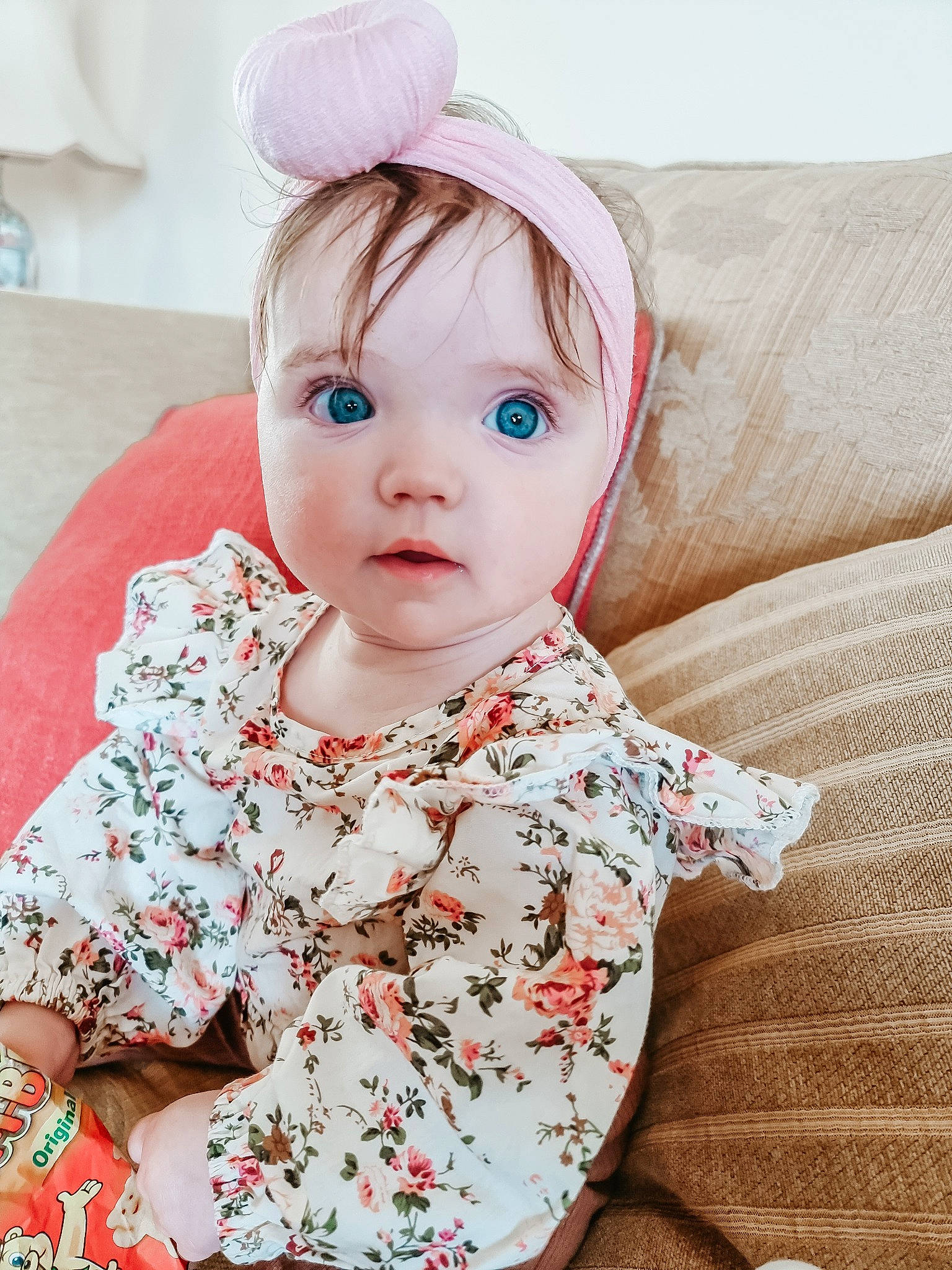 Martha is registered to the contest to win money with this photo: baby, baby_toddler_clothing, cap, chin, collar, comfort, dress, eye, eyelash, face, facial_expression, happy, hat, headwear, iris, lip, outerwear, person, pink, skin