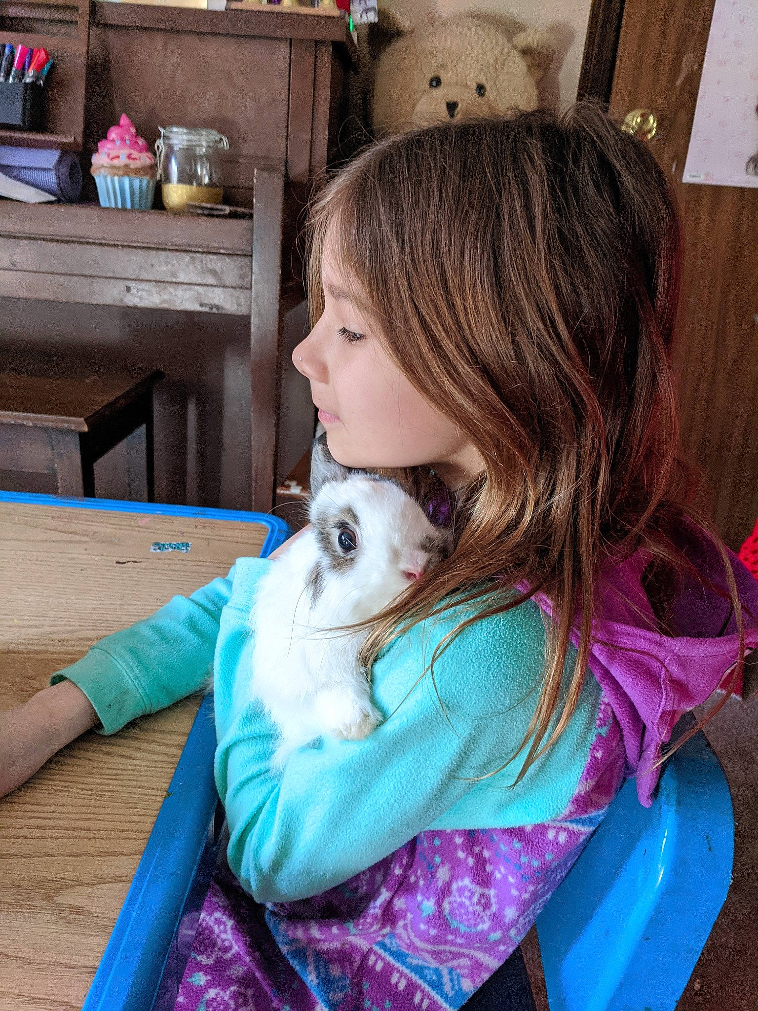 Katrina is registered to the contest to win money with this photo: canidae, carnivore, child, companion_dog, dog, dog_breed, hair_coloring, iris, non_sporting_group, person, puppy, puppy_love, toddler, toy_dog