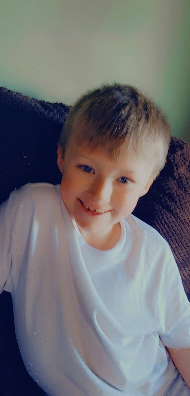 Hunter is registered to the contest to win money with this photo: arm, azure, chin, eye, eyebrow, face, forehead, hair, hairstyle, happy, head, joy, lip, neck, nose, person, shoulder, skin, sleeve, smile