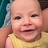 Ezio joined the competition — help win amazing prizes! baby, smiling, face, child, yellow_clothing, blanket, cushion, indoor, portrait, happy, closeup, infant, skin, eyes, arm, sleeveless, cozy, soft, cute, person