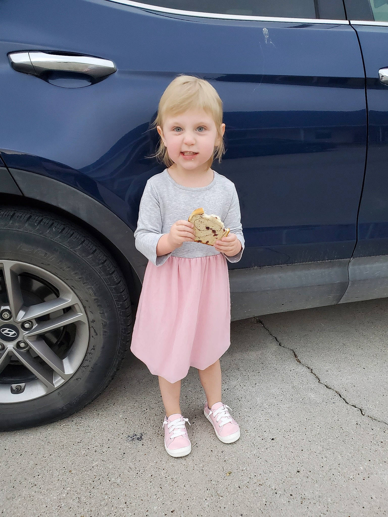 Dylan is registered to the contest to win money with this photo: alloy_wheel, auto_part, automotive_exterior, automotive_wheel_system, car, child, family_car, fender, luxury_vehicle, minivan, person, rim, sport_utility_vehicle, tire, vacation, vehicle, vehicle_door, wheel