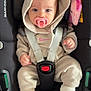 baby, infant, child, car_seat, pacifier, hoodie, sweatsuit, sneakers, nike, plush_toy, pink, white, seatbelt, maxi_cosi, cute, indoors, portrait, baby_clothing, small_child, comfort
