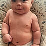 Bryson joined the competition — help win amazing prizes! baby, infant, diaper, smile, face, skin, arm, hand, leg, chubby, cushion, pattern, indoor, cute, portrait, child, relaxing, young, fingers, torso