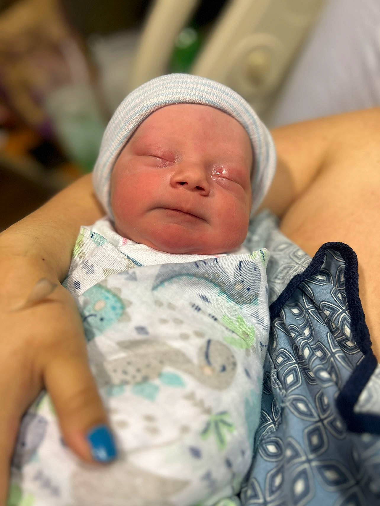 Josiah is registered to the contest to win money with this photo: baby, baby_products, baby_sleeping, baby_toddler_clothing, cap, cheek, child, comfort, event, eye, happy, hat, head, iris, linens, lip, pattern, person, skin, thumb